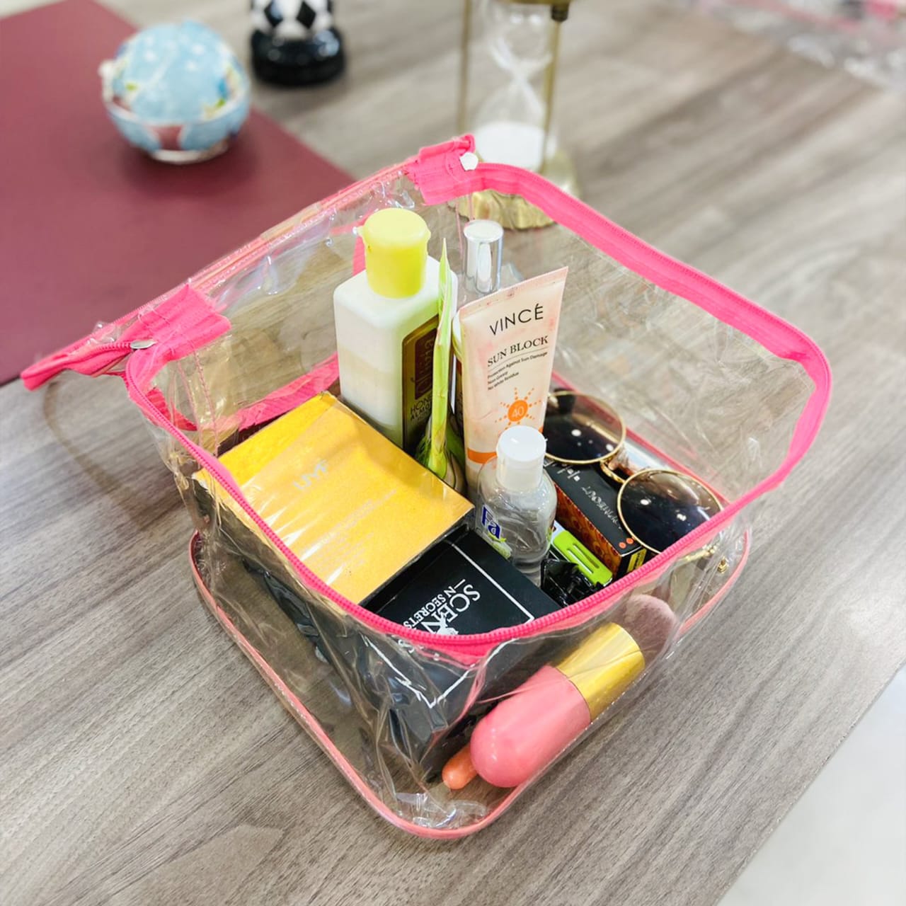 Transparent cosmetics pouch